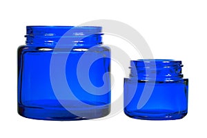 Two creme jars isolated on white background