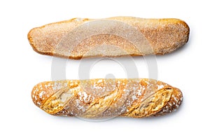 Two crispy fresh baguettes isolated on white background photo