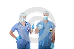 Two critical care nurses give a thumbs up gesture