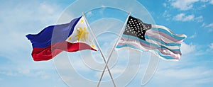 two crossed flags TransAmerica and Philippines waving in wind at cloudy sky. Concept of relationship, dialog, travelling between