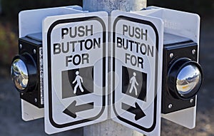 Two crosswalk buttons.