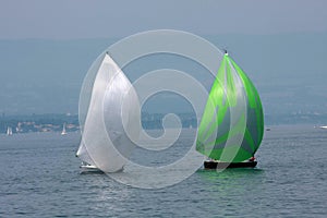 Two cruising sailboats