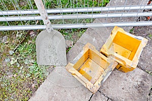Empty concrete cube molds for compressive strength test of the cement mixture photo