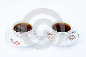 Two cup of coffee with white background.