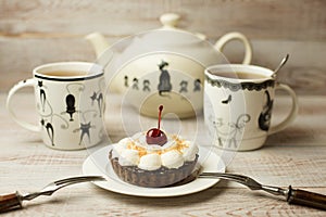 Two Cup of tea and cake on the table