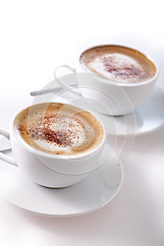 Two cups of cappuccino
