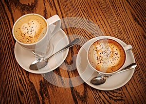 Two cups cappuccino and latte