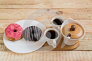 Two cups of coffee Cherry Chocolate doughnut donut