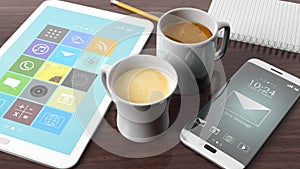 Two cups with coffee, tablet, smartphone,notepad and pencil