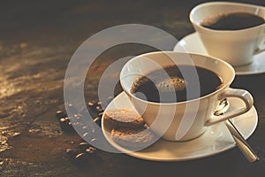 Two cups of expresso served in classy ceramic