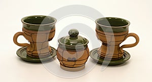 Two cups and sugar bowl