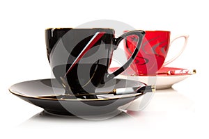 Two cups of tea isolated over white