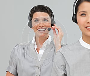 Two Customer service agents with headset on