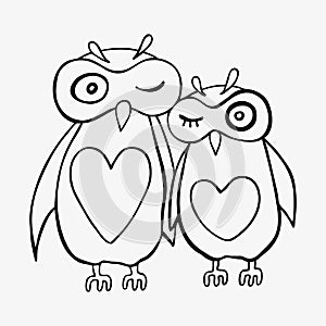 Two cute decorative owls.