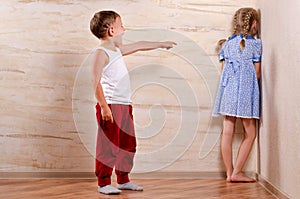 Two Cute Kids Playing Hide and Seek photo