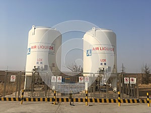 Two dangerous Oxygen container are surrended by closed rail