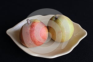 Two pears on a plate