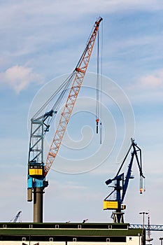 Two derricks in the container harbor of Hamburg