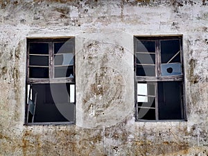 Two destroyed wooden windows
