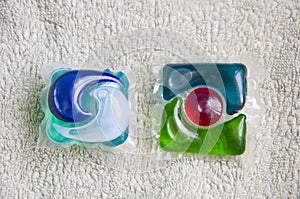 Two detergent pods closeup. minimalism of detergent. laundry detergent