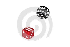 Two dice isolated on a white background. Red lies like six, and black flies in the air.