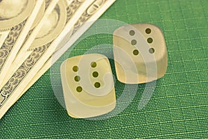 Two dice with number six on each
