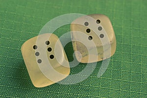 Two dice with number six on each