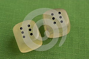 Two dice with number six on each