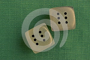 Two dice with number six on each