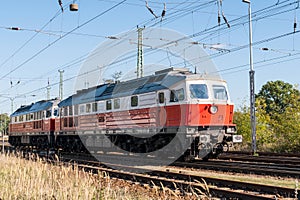 Two diesel locomotives on an electrified line