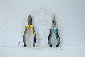 Two different pliers for carpentery and mechanic use
