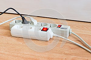 Two different power strips with two connected different mains ca