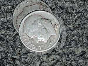 Two Dimes on Carpet