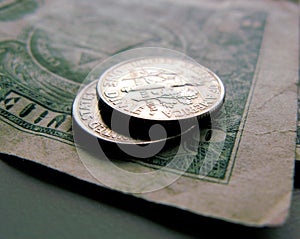 Two dimes on a dollar