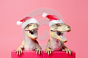 Two dinosaurs Rex in red Santa Claus hat holds golden gift box in its paws on pink background New Years Eve or Christmas Eve Art h