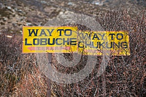 Two direction arrow choices, left way to Lobuche and right way t
