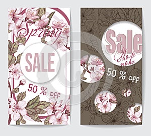 Two discount flyers with cherry blossoms