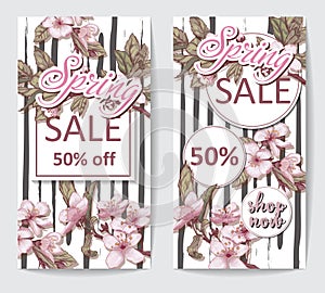 Two discount flyers with cherry blossoms