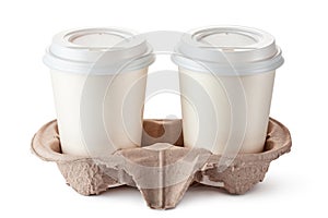 Two disposable coffee cups in cardboard holder photo