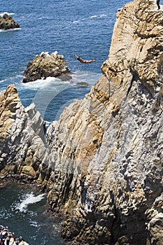 Two Divers Leaping Off