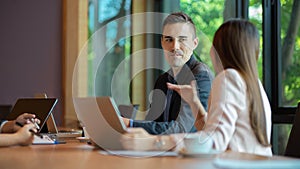 Two diverse business people are having great business conversation