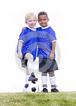 Two diverse young soccer players on white background