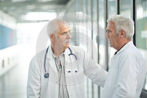 Two doctors on corridor
