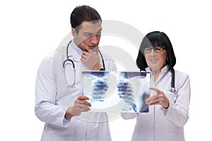 The two doctors looking at x-ray image isolated on white