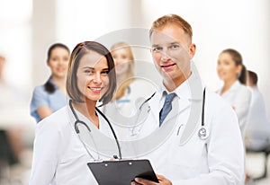 Two doctors with stethoscopes