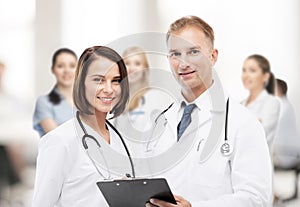 Two doctors with stethoscopes