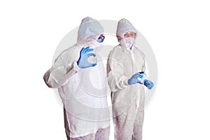 Two doctors in white paramedic uniforms, isolated on a white backgro