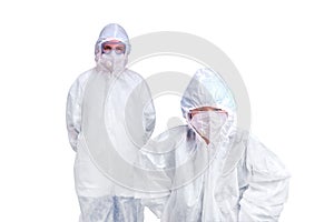 Two doctors in white paramedic uniforms isolated on a white background