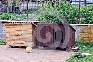 Two dog house booths in the yard