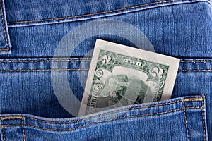 Two dollars in a pocket of jeans